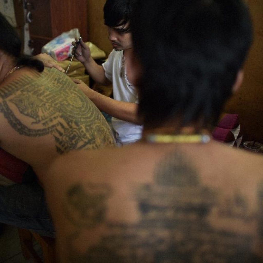 Animal trances and tattoos at Thai Buddhist festival